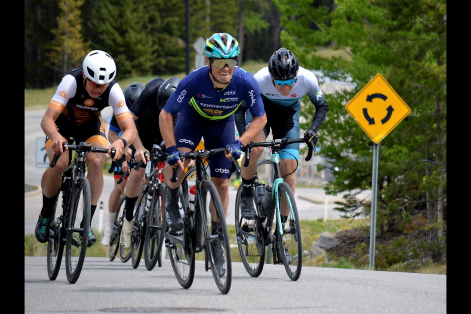 There's a race to the finish line in the men's CAT 1/2,112.5 km road race at the Rundle Mountain Road Festival on Sunday (June 5). Evan Burtnik was first, Brayden Windsor was second, and Canmore's Connor Howe was third. JORDAN SMALL RMO PHOTO