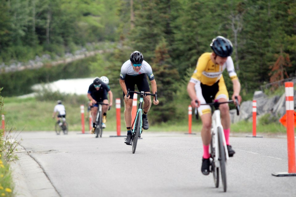 Canmore's Connor Howe, a world cup speed skating gold medallist, turns on the turbo charges on Silvertip Road during the men's Cat 1/2 hill climb at the RMCC Road Festival in Canmore on Saturday (June 3). Howe finished in sixth place. JORDAN SMALL RMO PHOTO