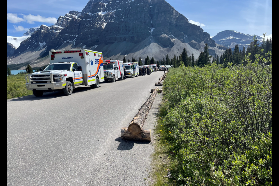 Ambulances line up at Bow Lake day-use area, awaiting patients from a rockfall near Bow Glacier Falls. | Submitted Photo