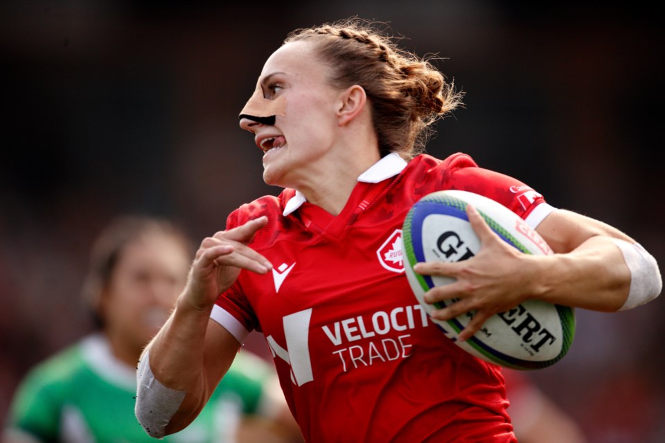 Wearing face bandages after breaking her nose, Krissy Scurfield runs over the try line against Mexico in the final match of the Olympic Qualifier on Sunday (Aug. 20) in Langford, British Columbia. RUGBY CANADA PHOTO
