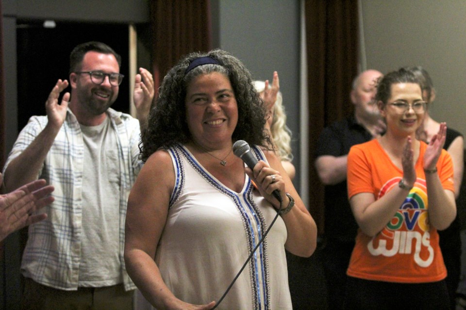 NDP candidate Sarah Elmeligi gives a speech to her supporters at Canmore Miners' Union Hall after her party declares victory in the Banff-Kananaskis riding on Monday (May 29). JORDAN SMALL RMO PHOTO