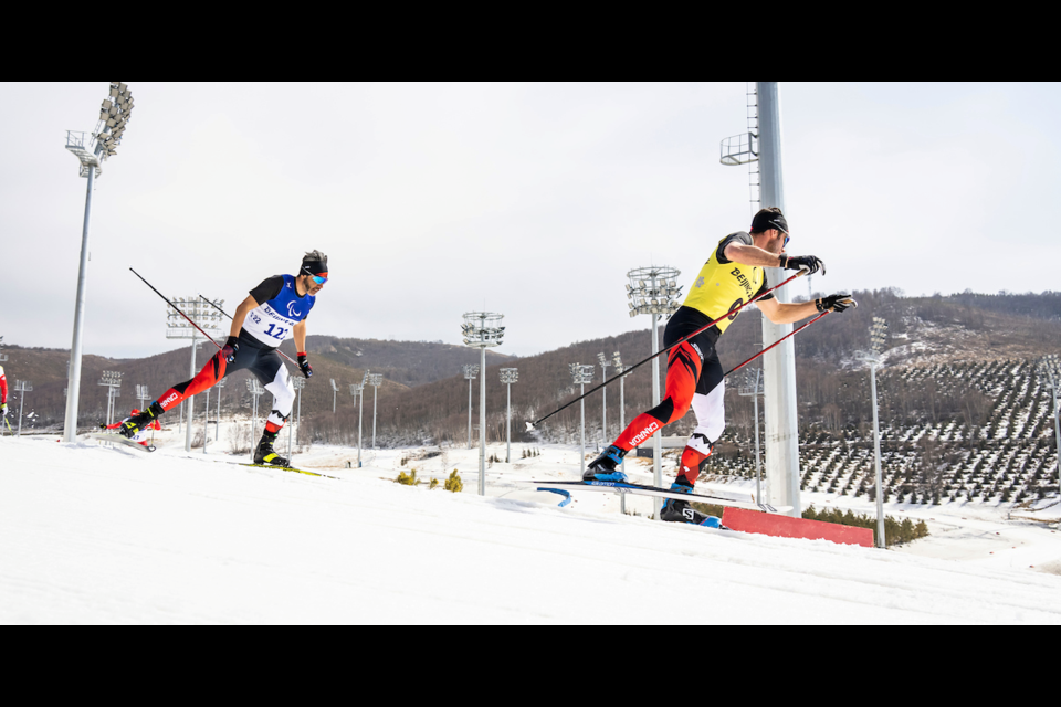 Canada's Brian McKeever and guide Russell Kennedy compete at the Beijing 2022 Winter Paralympic Games. DAVE HOLLAND CANADIAN PARALYMPIC COMMITTEE PHOTO