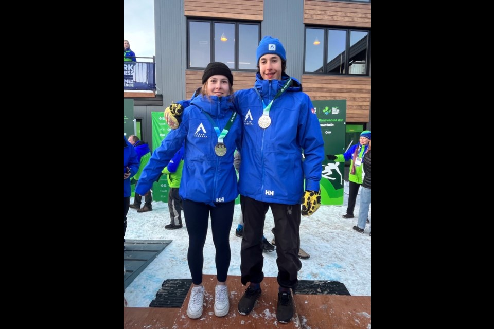 Team Alberta's Rebecca Pelkey and Thomas Cais show off their silver medals at the 2023 Canada Winter Games. SUBMITTED PHOTO