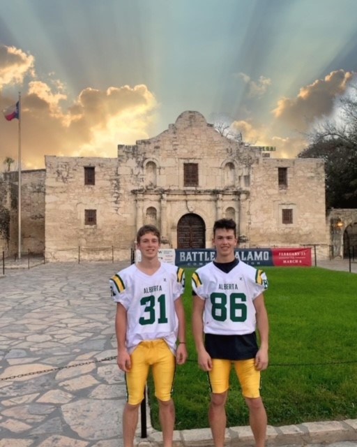 Kai Perron, left, and Bryton Kapitza in front of the Alamo in San Antonio, Texas, during the International Border War football tournament.