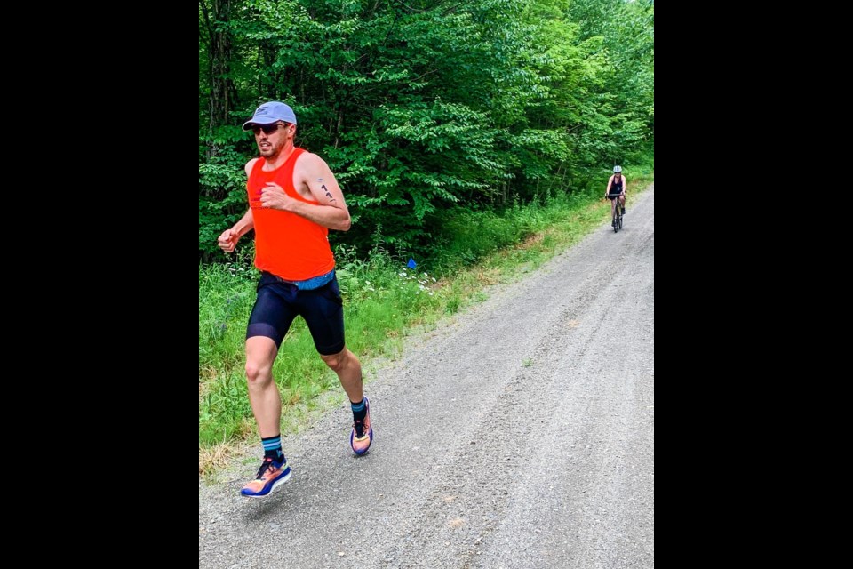 Jordan Bryden runs the last leg of the Canada Man EXtreme Triathlon on Sunday (July 3). SUBMITTED PHOTO
