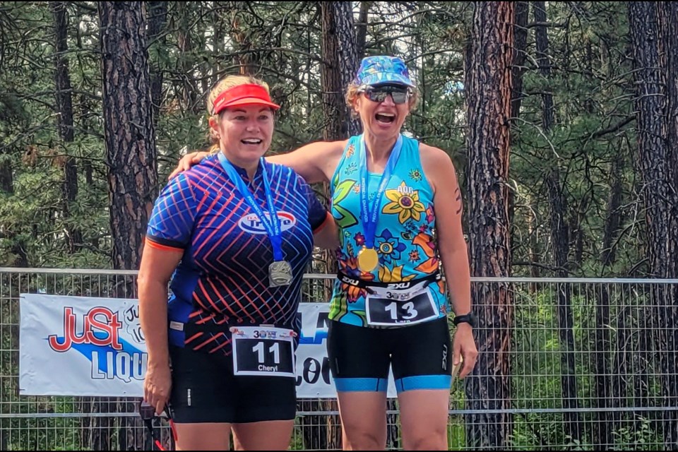 Canmore's Lara Seward-Guenette, right, and Cheryl Comeau following their gold and silver medal performances at the Wasa Lake Triathlon sprint on Saturday (June 10) in Cranbrook, British Columbia. SUBMITTED PHOTO