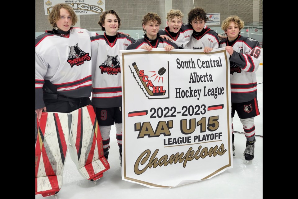 Six locals – Kingston Cuell, Grayden Solodan, Austin Gammon, Chase Kjemhus, Lukas Boruta, and Easton Milne – helped the U15AA Bow Valley Timberwolves win the 2022-23 South Central Alberta Hockey League banner. SUBMITTED PHOTO