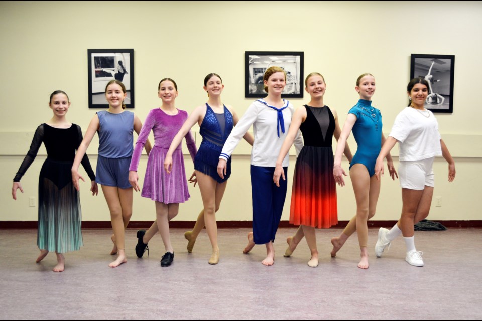 Ready to perform in Canmore Dance Corps' year-end show are Anne-Sophie Thiboutot, left, Finlie Danielson, Evey Moore, Sophie Auld, Liv Storms, Wilma Graul, Nya White, and Alexis Gill. JORDAN SMALL RMO PHOTO