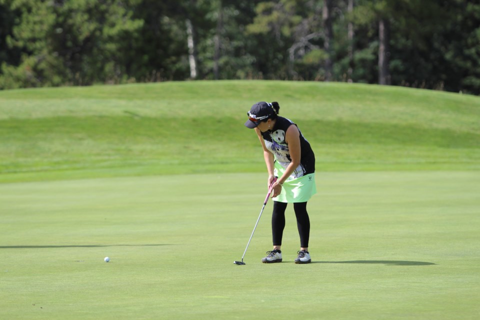 Vicki Young watches her putt head for the hole during the Club Championships at the Canmore Golf & Curling Club course, Sunday (Aug. 25). Jordan Small RMO Photo