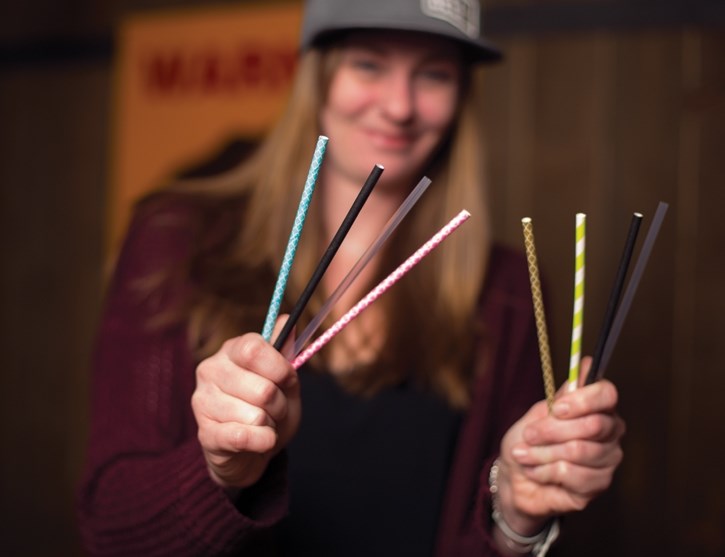 Heather Johnson, assistant manager for the Grizzly Paw Restaurant and Pub, shows off a variety of environmentally friendly straws at the pub in Canmore.