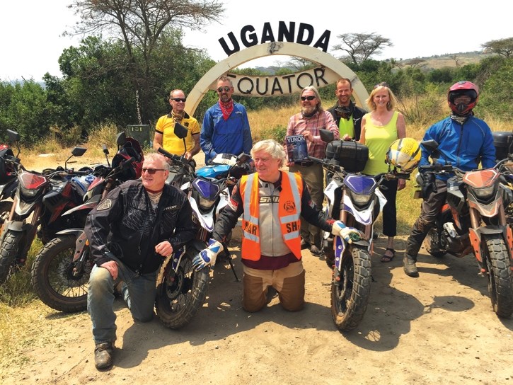 The crew on the equator in Uganda, including Embrace’s Paul Carrick, centre front, and Deb Carrick, right rear.