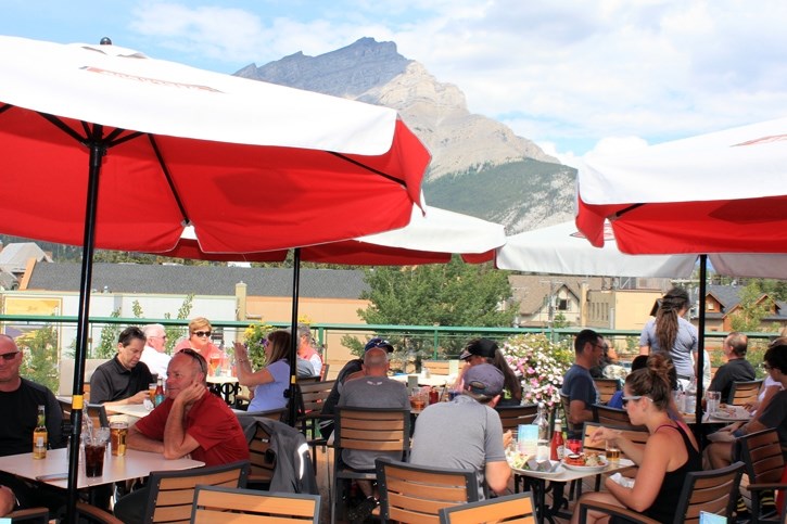 Fees for restaurants and coffee shops with sidewalk seating patios in Banff are going up for the first time in eight years to bring them more in line with what other resort