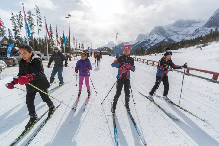 Students prepare to take off from the cross-country arena during the Spirit North ski event at the Canmore Nordic Centre on Tuesday (March 6).