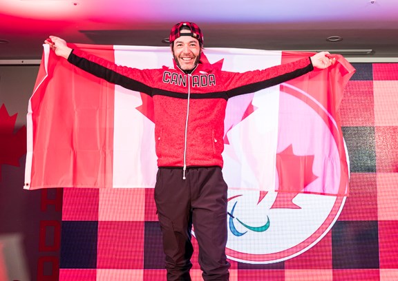 Canmore athlete Brian McKeever proudly displays the Canada flag after being name the flag bearer for the opening ceremonies of the PyeongChang Paralympic Games.