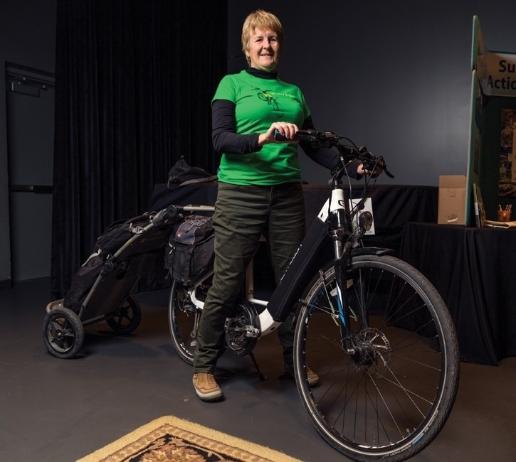 Mandy Johnson of Community Cruisers sits on her pedal assist electric bike in 2017. The e-bikes, which range from $2,000 to $5,000, can provide 100km of powered range and can 