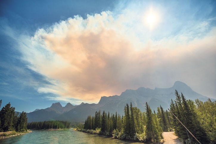 A plume of smoke from the Verdant Creek wildfire makes its way into Canmore in 2017.