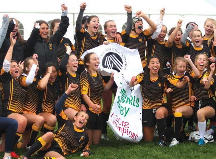 The BCHS Bears rugby girls beat their counterparts from Springbank Community High School 92-0 to win the zone title and assert their dominance in the sport, May 31.