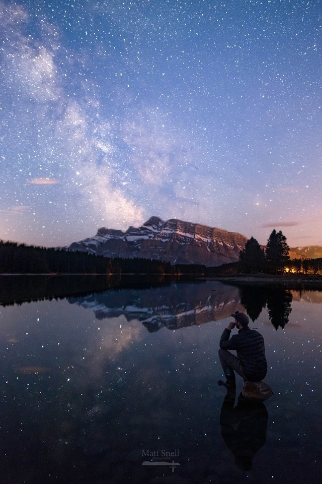 A self portrait by 26-year-old Banff photographer Matt Snell from May 20 with the Milky Way and Mount Rundle in the background. Snell was identified as the climber who died