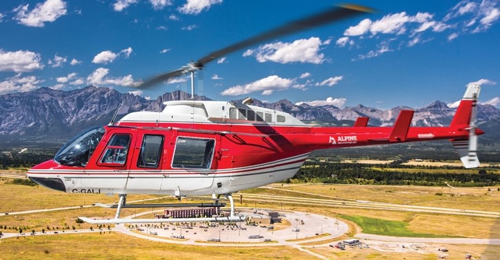 An Alpine Helicopters craft above the Stoney Nakoda Casino.