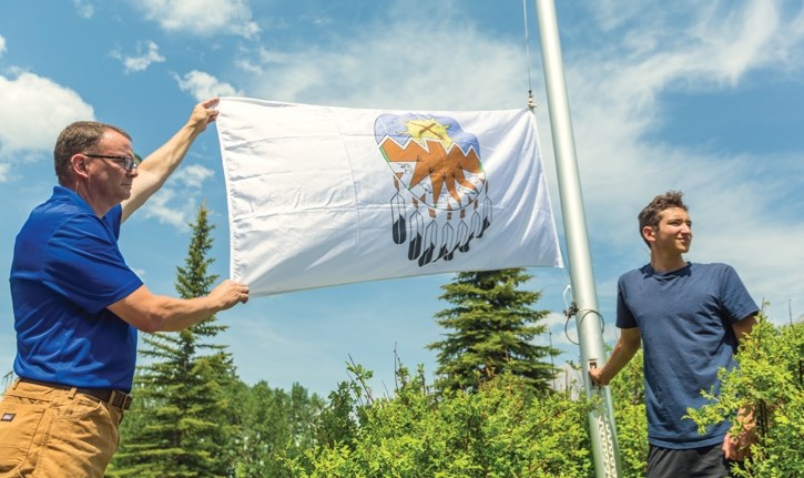 The Treaty 7 flag is raised at Canmore Collegiate High School in Canmore on Thursday (June 7).