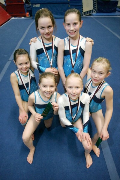 Standing: Skylar Belczyk and Mia Landi. Front (L to R) Jazlyn Evans, Lindsay Bischoff, Abby Houck and Erika Lepper.