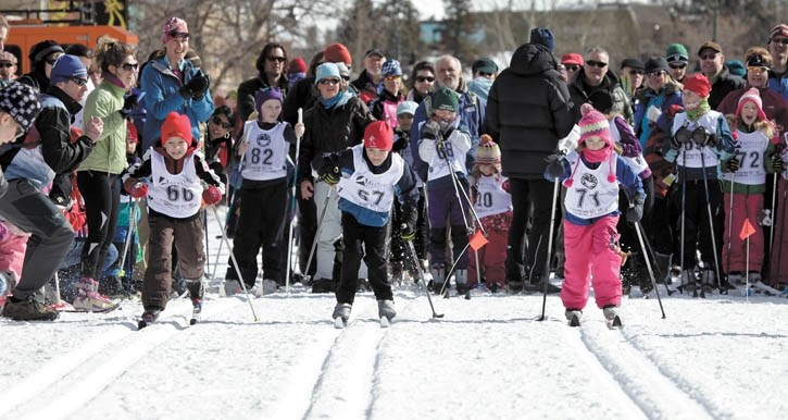 Sergey Babikov, Lucas Hornyansky and Nevi Henderson ski in front of an enthusiastic crowd during the Jackrabbit Mini Sprints on Saturday (March 12).