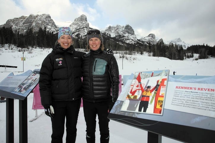 Beckie Scott and Sara Renner enjoy the moment as two sections of cross-country ski trails are named in their honour at the Canmore Nordic Centre Monday morning (March 14).