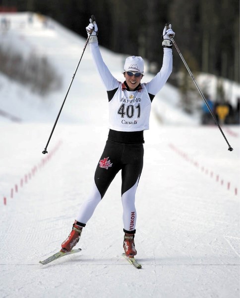 Emily Nishikawa crosses the finish line victorious in Saturday’s (March 12) Canadian championships team sprint event at the Canmore Nordic Centre.
