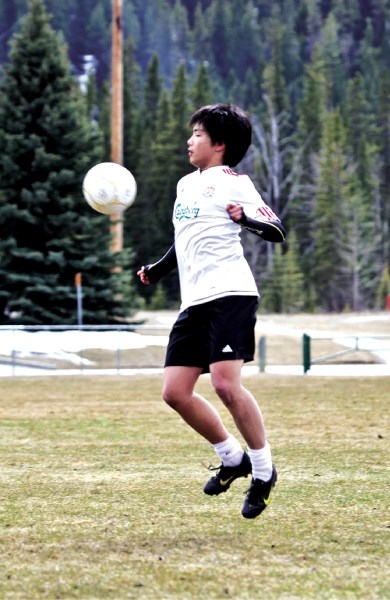 Kosuke Shimizu controls a ball during a CCHS practice, Monday (April 25).