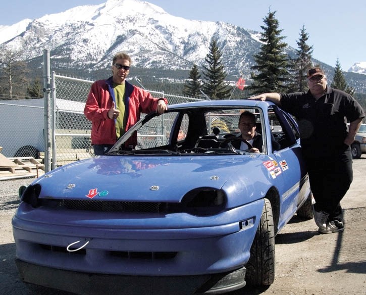 Jeff Taylor, Russ Bignold and Ken Anderson will race their 1995 Dodge Neon in the ChumpCar race in Calgary next month. The team paid $300 for the car, which must last for two 