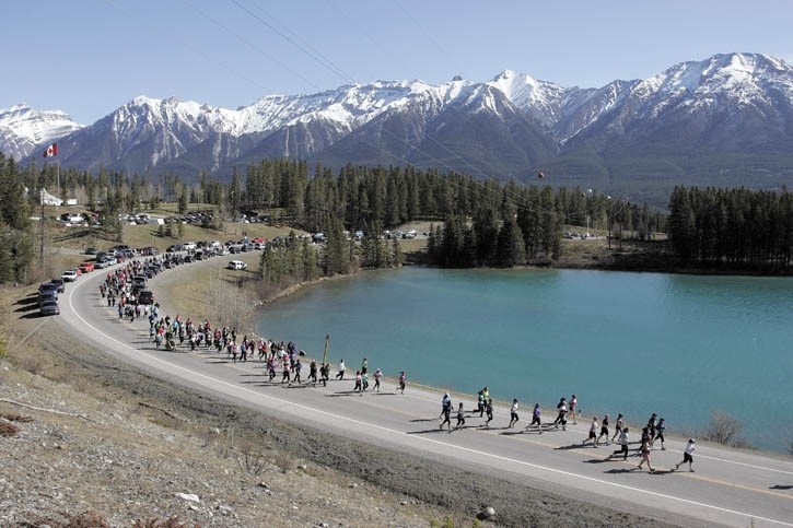 Competitors snake away from the Canmore Nordic Centre energized by a stunning spring morning during the Rocky Mountain Soap Company Women’s Run and Walk, Saturday (May 14).