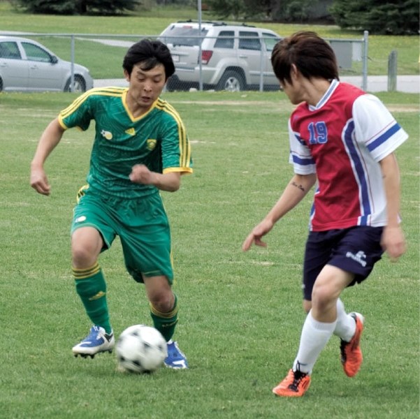 Jiho Chun drives upfield during Monday’s match against Strathmore.