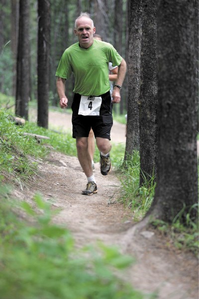 Tony Lambert from Edmonton races to victory during the four-kilometre distance race at Saturday’s (July 9) Canmore Challenge Trail running event at the Canmore Nordic Centre.