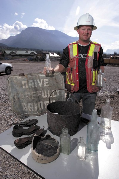 John Third of Graham Construction shows off artifacts found during excavation of the Canmore Multiplex site.