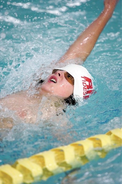 Riptides swimmer Sean Parker competes in the 50 metre backstroke.