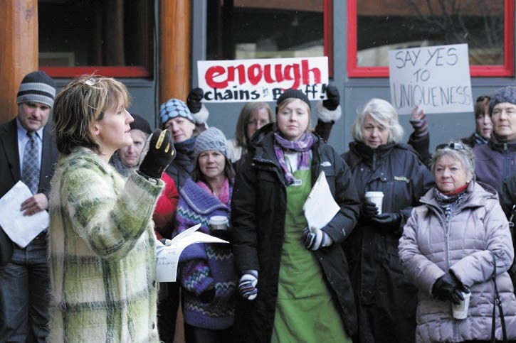 Susanne Gillies Smith addresses supporters of her business, the Banff Tea Company, as they rally outside Banff Town hall Friday (Nov. 25).