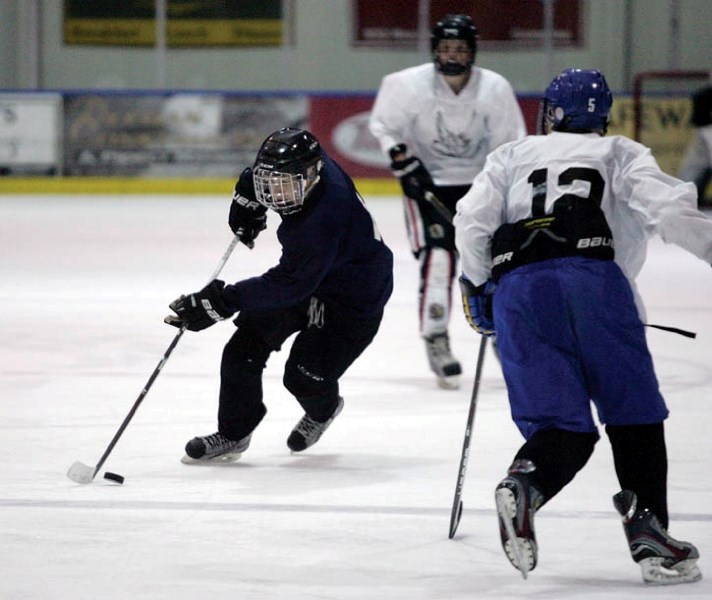 Prospect Kyler Nachtigall from Calgary does his best to impress during the Canmore Eagles’ spring camp at the Canmore Rec Centre Saturday (April 21). Around 150 young players 