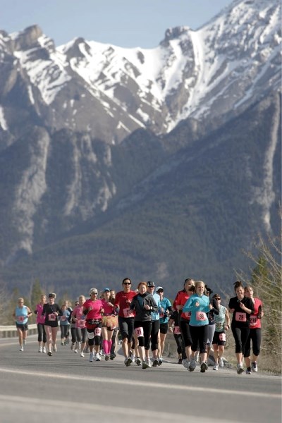 Competitors in Saturday’s (May 12) Rocky Mountain Soap Company Women’s Run pour down from the Canmore Nordic Centre.
