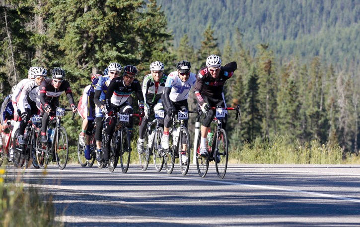 Matthew Decore of Edmonton leads the front-running peloton off Highway 1A onto the Trans-Canada Highway during the RBC GranFondo, Saturday (Aug. 25). Decore ended up in