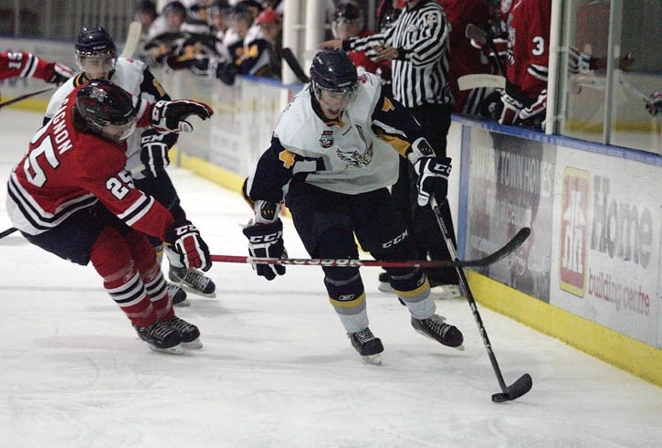 Canmore Eagles defenceman John Stevens leads the rush during Friday night’s (Sept. 14) win over the Whitecourt Wolverines.