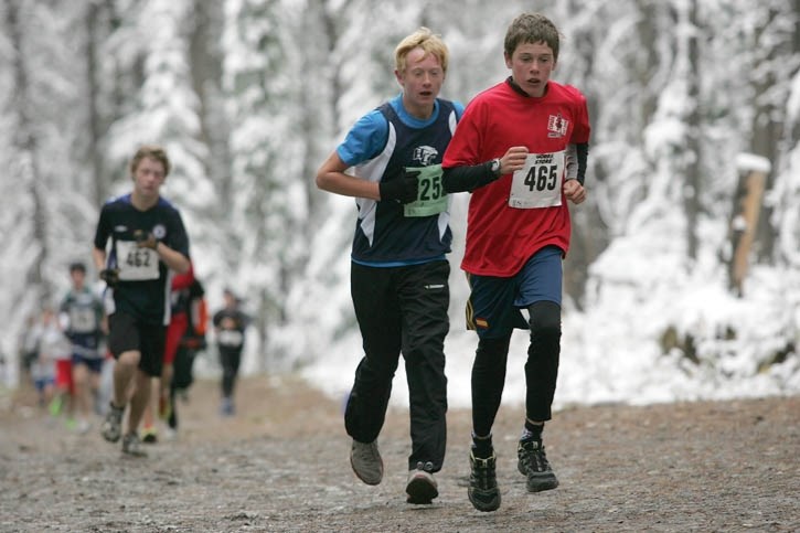 Canmore’s Sam Hendry (465) races to second place in the midget boy’s division of Wednesday’s (Oct. 3) South Central Zone Cross-Country Running Championships at the Canmore