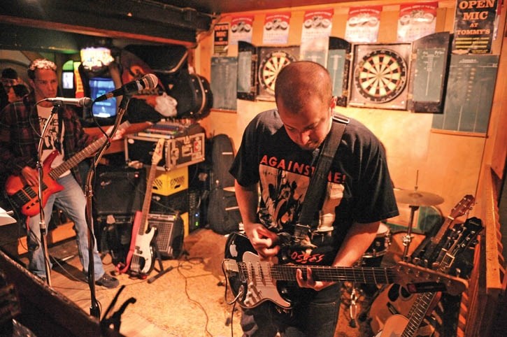 Trevor Duke leads the jam at Tommy’s Neighbourhood Pub in Banff, Dec. 1.