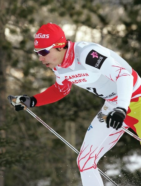 Jess Cockney powers up a climb during his impressive ninth-place sprint effort on home snow at the Canmore Nordic Centre, Saturday (Dec. 15).