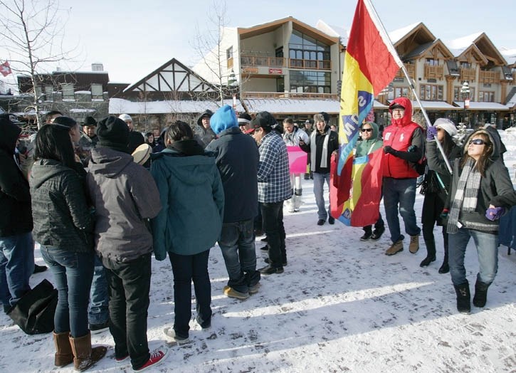 Protesters dance around a drum circle as they add their voice to Saturday’s (Jan. 12) Idle No More protest on Banff Avenue.