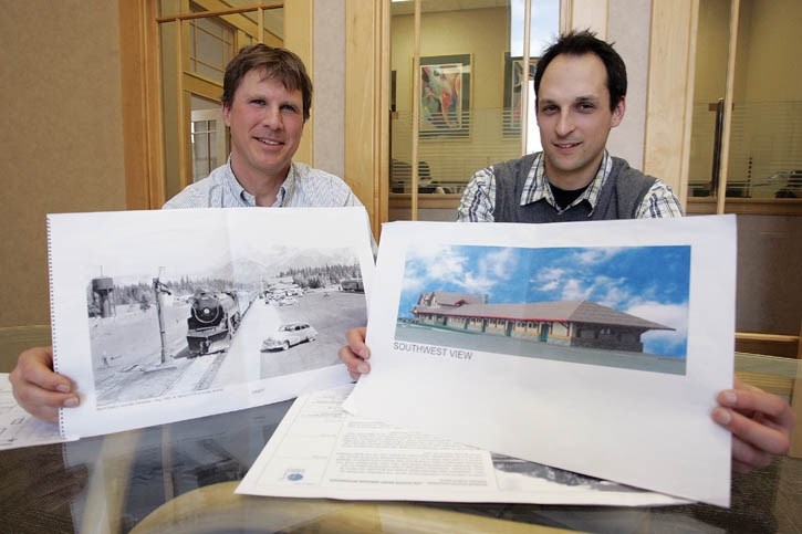 Caribou Properties president Gordon Lozeman (L) and Shawn Birch, director of purchasing and products, show off a historic photo and a rendering of their Banff Train Station