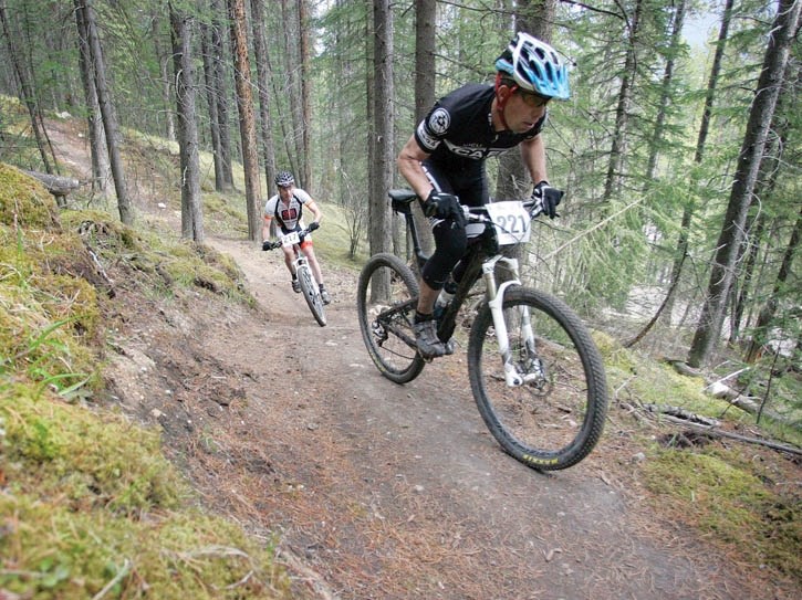 Leighton Poidevin competes in the Kananaskiker mountain bike race on the Canmore Nordic Centre’s renowned single track trails.