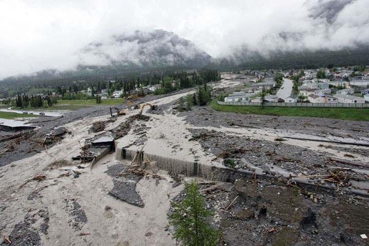 Crews continue to monitor Cougar Creek after it washed out the Trans-Canada Highway on Thursday and continued to cause concerns on Friday.