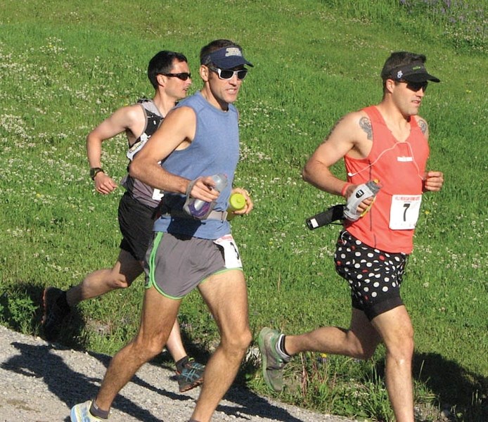 Andy Reed (blue) races to victory in the Wild Mountain Fernie Ultra Marathon.