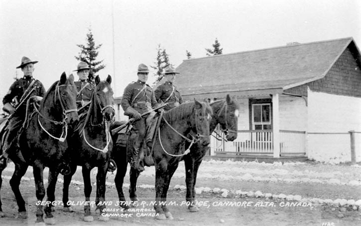 NWMP Sgt. Oliver and his staff posed on horseback in front of the barracks for amateur photographer and Canmore postmistress Daisy Carroll in the early 1900s.
