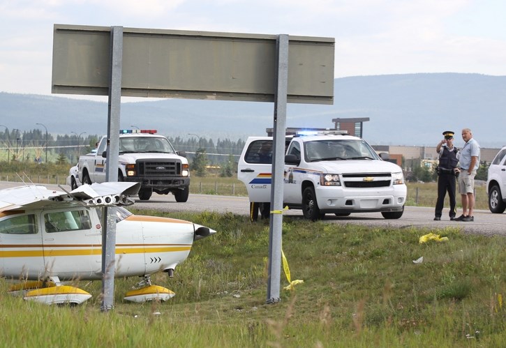 Nelson, B.C. pilot Milt Janzen relates the tale of his emergency landing on Highway 40 near the Stoney Nakoda Casino to a Global TV crew, Friday (Aug. 16). Janzen and a